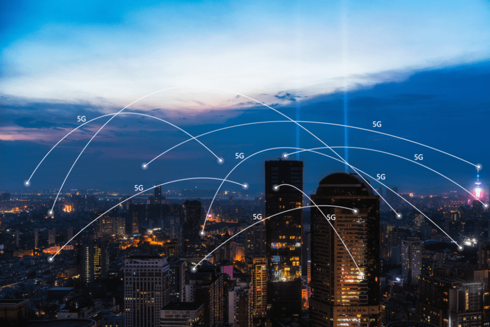 City skyline with 5G network connectivity lines.